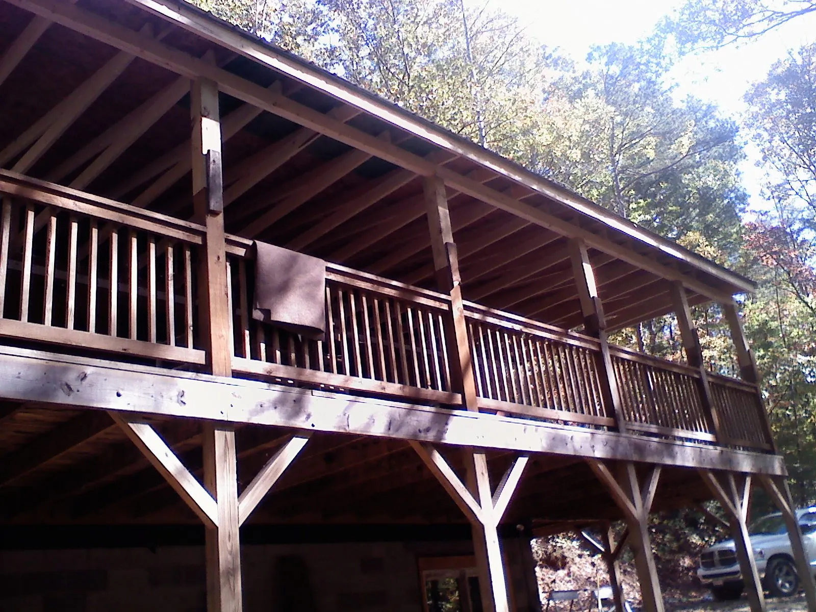 Timber framing under a new elevated porch and deck — Roof Leak Repair in Berlin Center by Roofing Brothers